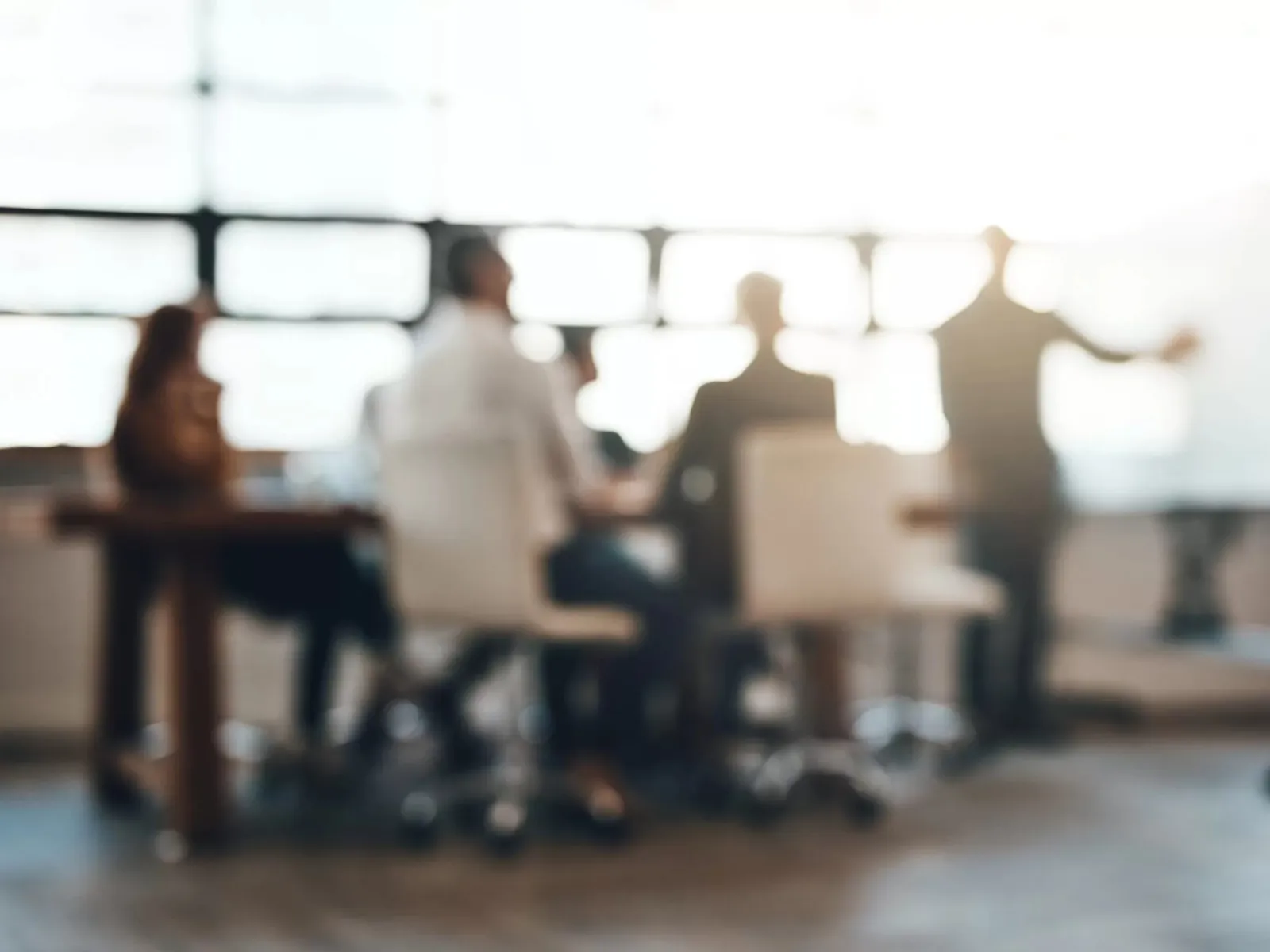 a group of people sitting at a table